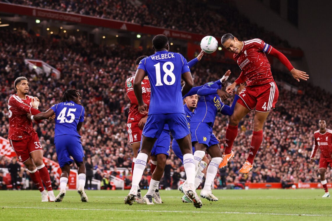 Virgil van Dijk of Liverpool heads the ball into the hand of Wesley Fofana of Chelsea