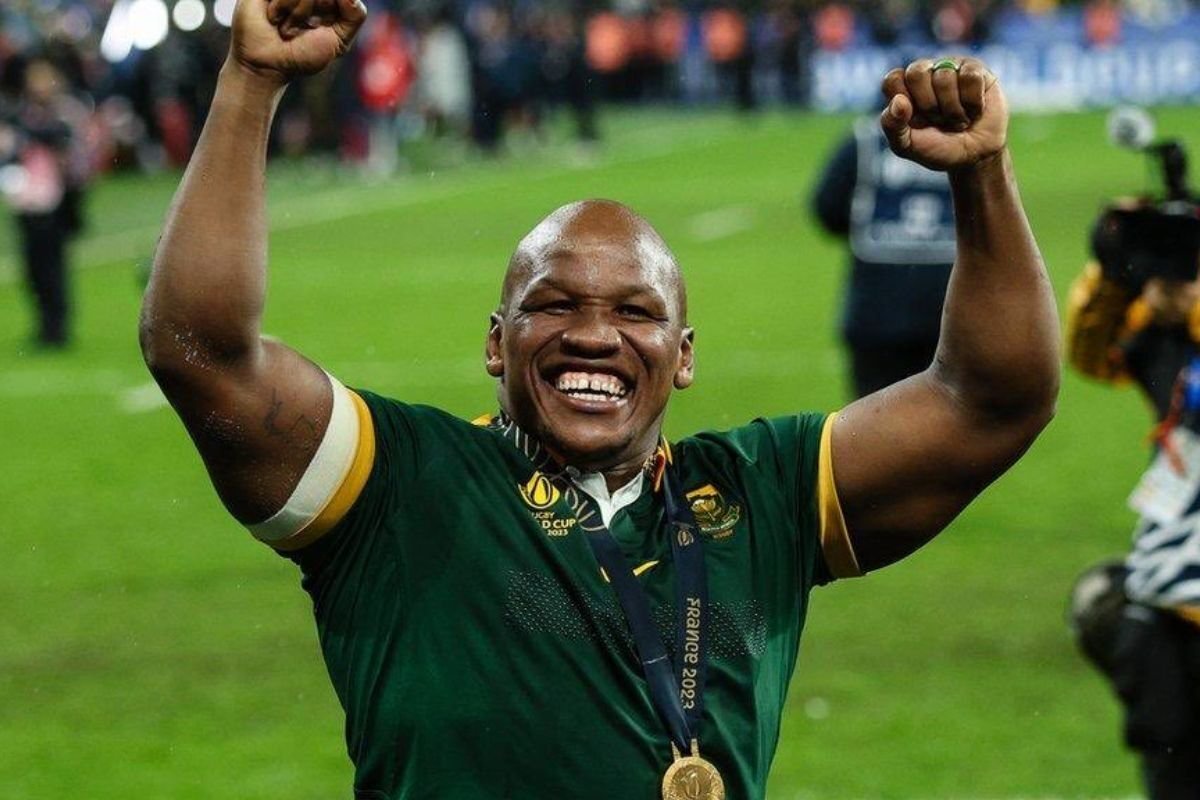 Bongi Mbonambi | Springbok hooker Bongi Mbonambi raises his fists in celebration while wearing his 2023 Rugby World Cup winner’s medal.