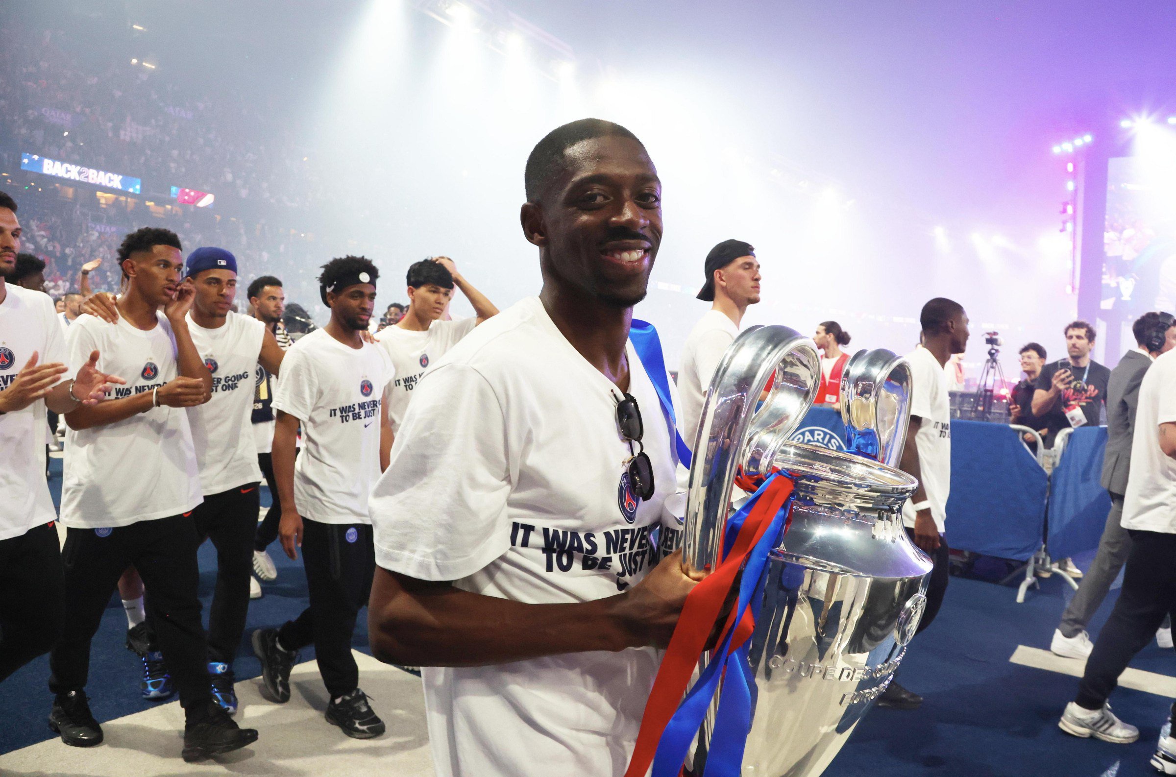 PARIS, FRANCE - MAY 31: Ousmane Dembélé of Paris Saint-Germain celebrates the trophy during the 2026 Champions League Trophy presentation to the Paris Saint-Germain fans at Parc des Princes on May 31, 2026 in Paris, France. (Photo by Xavier Laine/Getty Images)