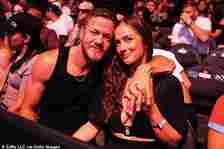 Dan Reynolds, 36, gushed about his nearly two-year relationship with actress, Minka Kelly, 44, and sweetly said they've been 'attached at the hip' since their romance began; seen in June in Las Vegas