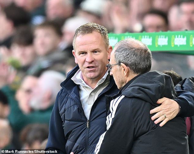 Martin O'Neill shakes hands with Hearts boss Wouter Vrancken after Celtic's 7-1 triumph