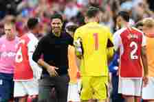 Mikel Arteta, Manager of Arsenal, interacts with Matt Turner of Nottingham Forest following the Premier League match between Arsenal FC and Notting...