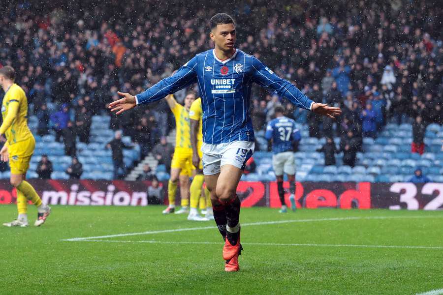 Kevin Kelsy celebrates after scoring Rangers' third goal against St. Johnstone