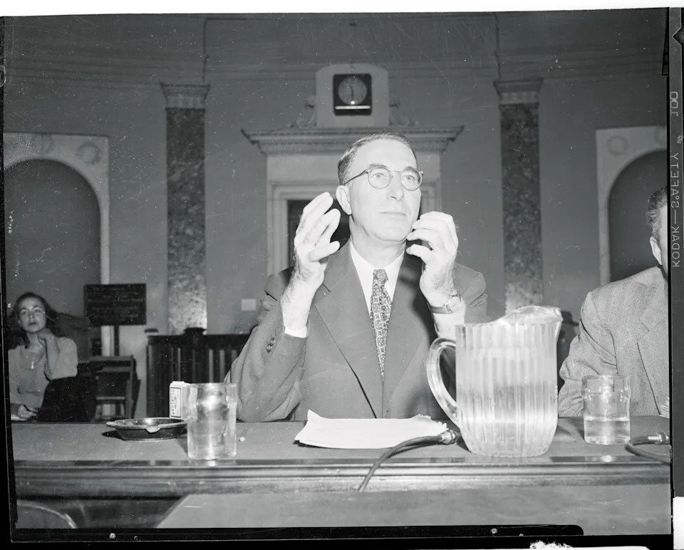 (Original Caption) Sen. Estes Kefauver (D. Tenn) as he testified before the Joint Congressional Atomic Energy Committee here today. He said the Dixon-Yates contract, modified by several supporting documents is a "sloppy business" which will be dragged thru law courts "time and time again."