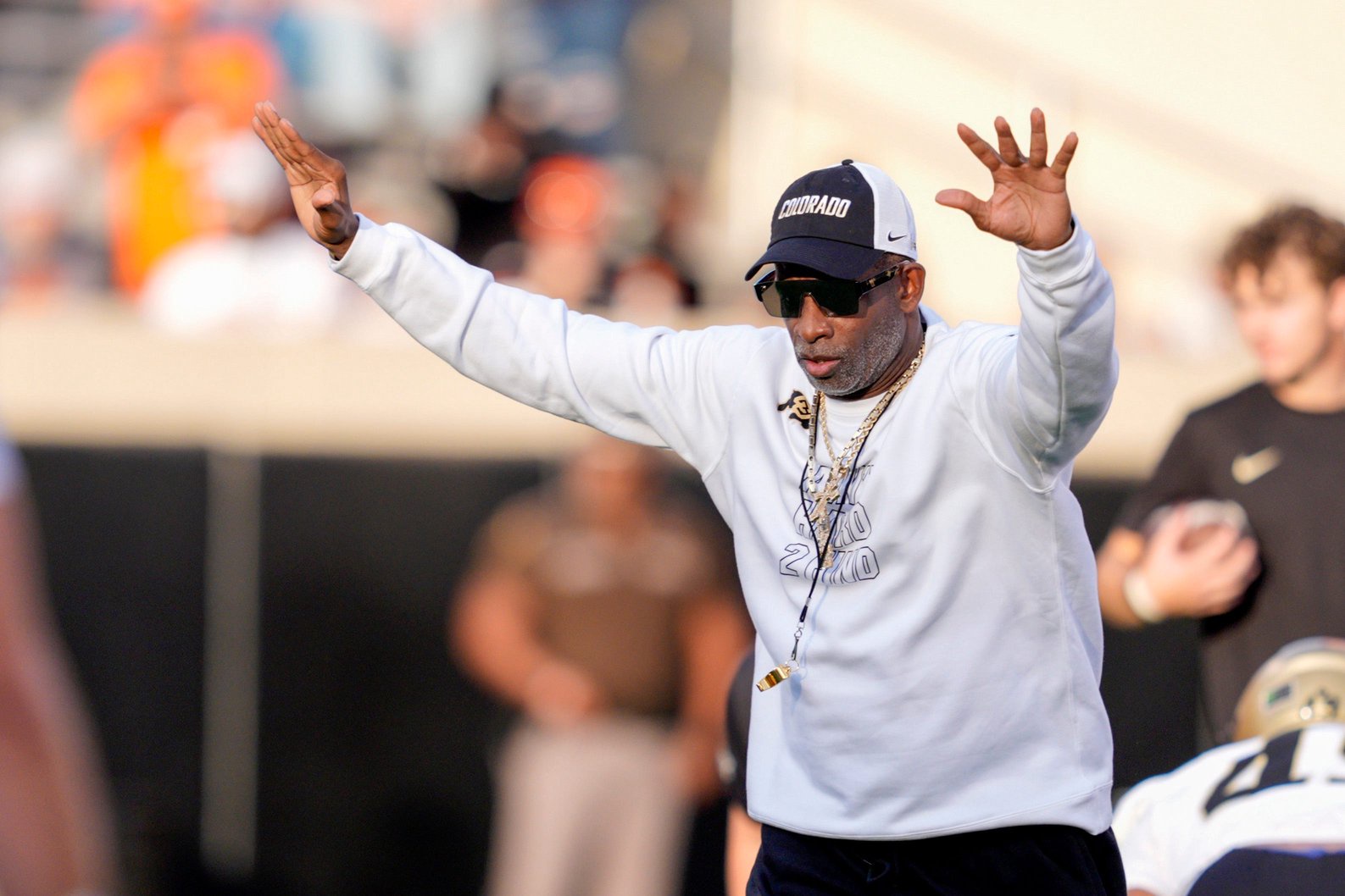 Colorado coach Deion Sanders stands on the field  as the team warms up before a college football game between the Oklahoma State Cowboys (OSU) and the Colorado Buffaloes at Boone Pickens Stadium in Stillwater, Okla., Saturday, Oct. 24, 2026.