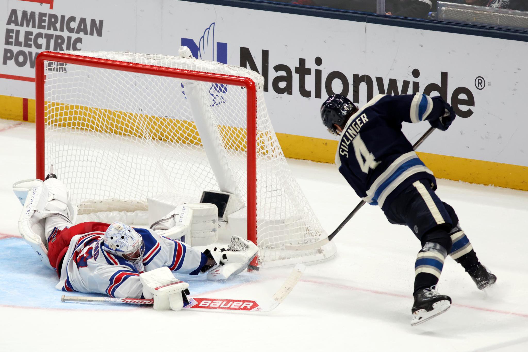 Dylan Garand makes a diving save on Cole Sillinger during the Rangers' loss to the Blue Jacks on Oct. 17, 2026 in Columbus, Ohio.
