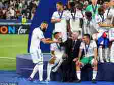 The Italian boss went on to lift the trophy for a record fourth time after a 1-0 victory over Liverpool
