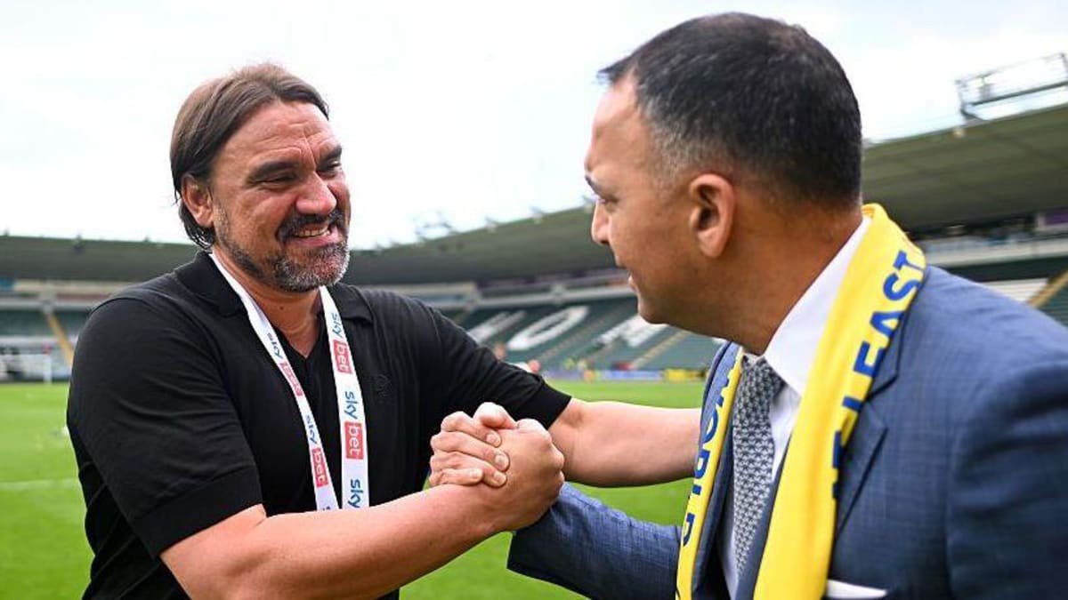 Daniel Farke, Manager of Leeds United, embraces Paraag Marathe, Chairman of Leeds United and minority shareholder of the 49ers Enterprise group Limited who own Leeds United