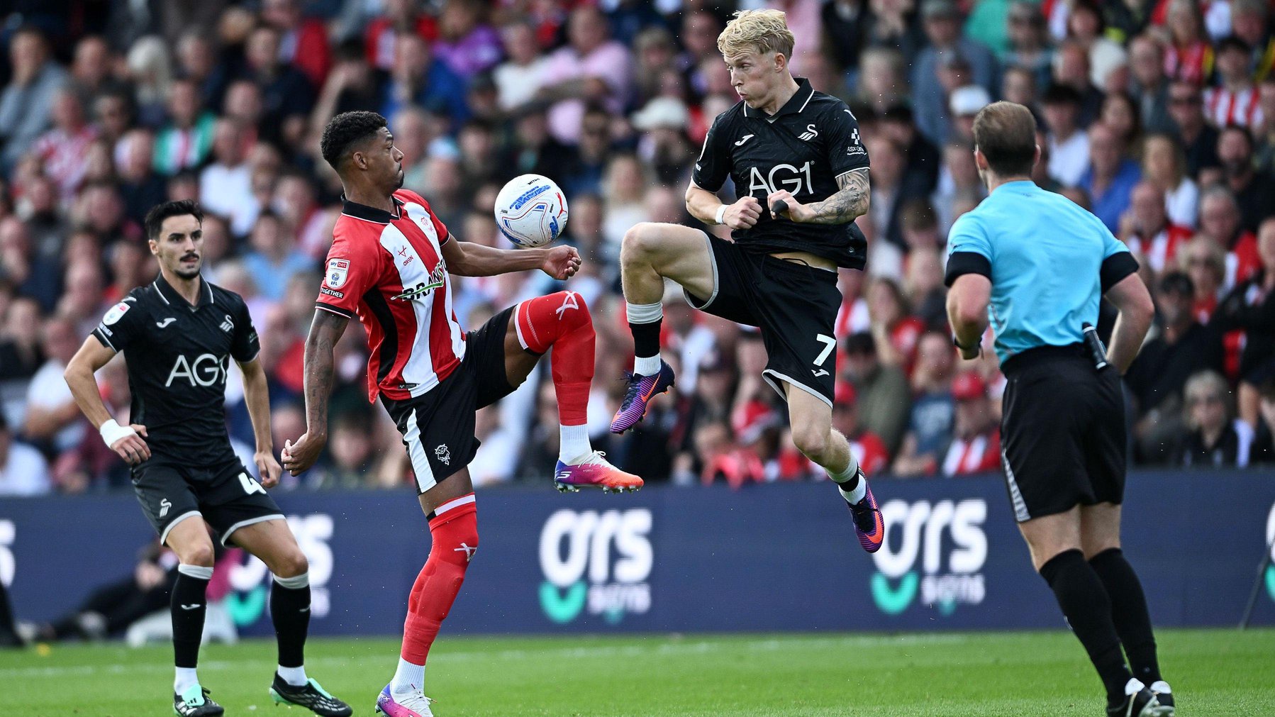 Melker Widell battles for possession at Lincoln 