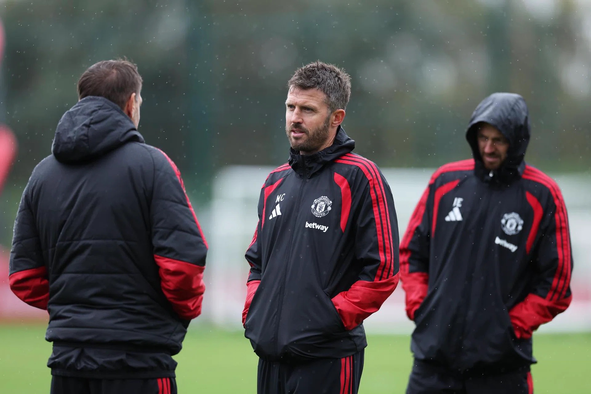 Michael Carrick with Jonathan Woodgate and Jonny Evans