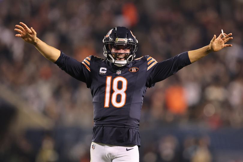 Caleb Williams #18 of the Chicago Bears celebrates a touchdown against the New England Patriots during the third quarter of the game at Soldier Field on October 22, 2026, in Chicago, Illinois.