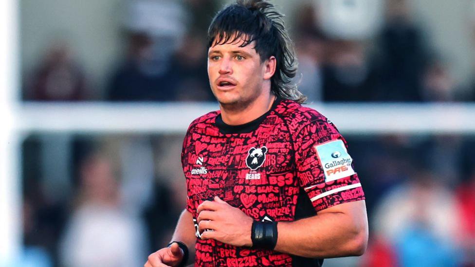 Benhard Janse van Rensburg in a red mottled Bristol Bears shirt