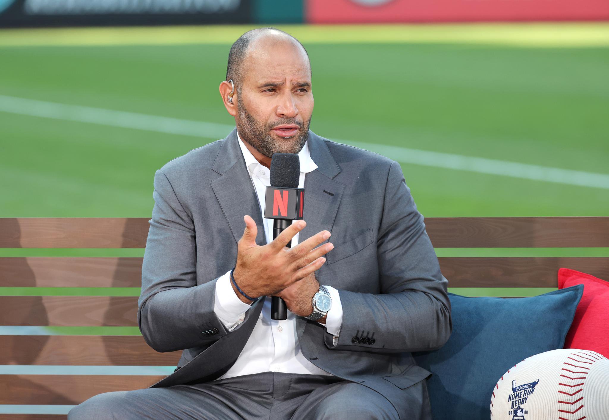 St. Louis Cardinals great Albert Pujols serves as a commentator for Netflix on the field before the start of the MLB All-Star Home Run Derby, July 13, 2026.