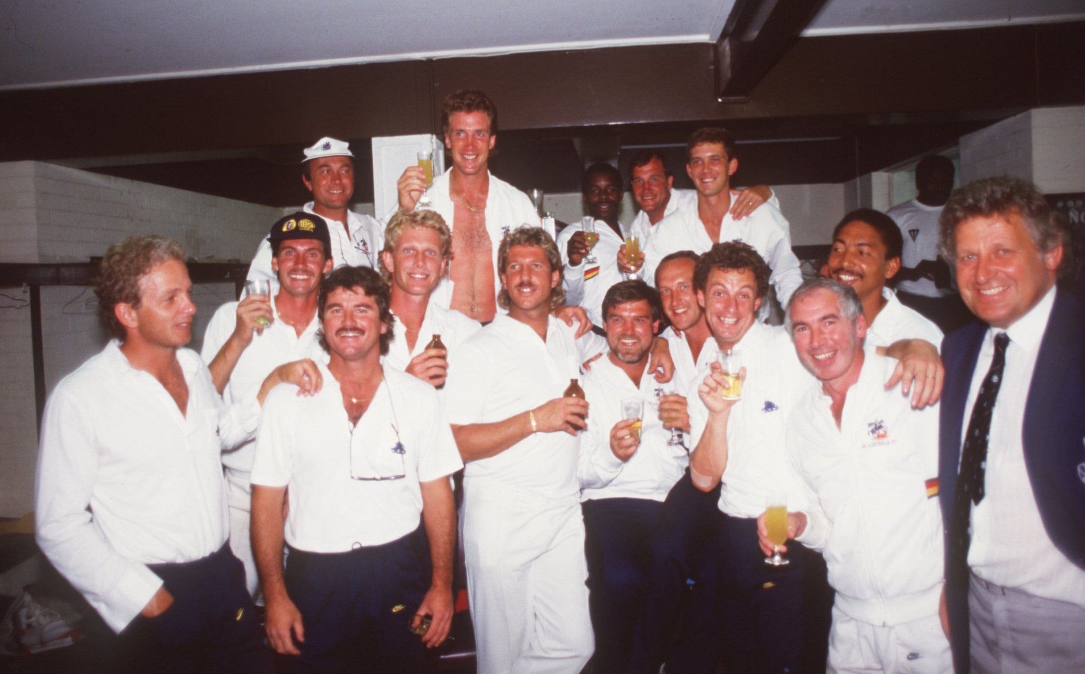 Botham, standing front row centre, celebrated his second Ashes triumph in 1986