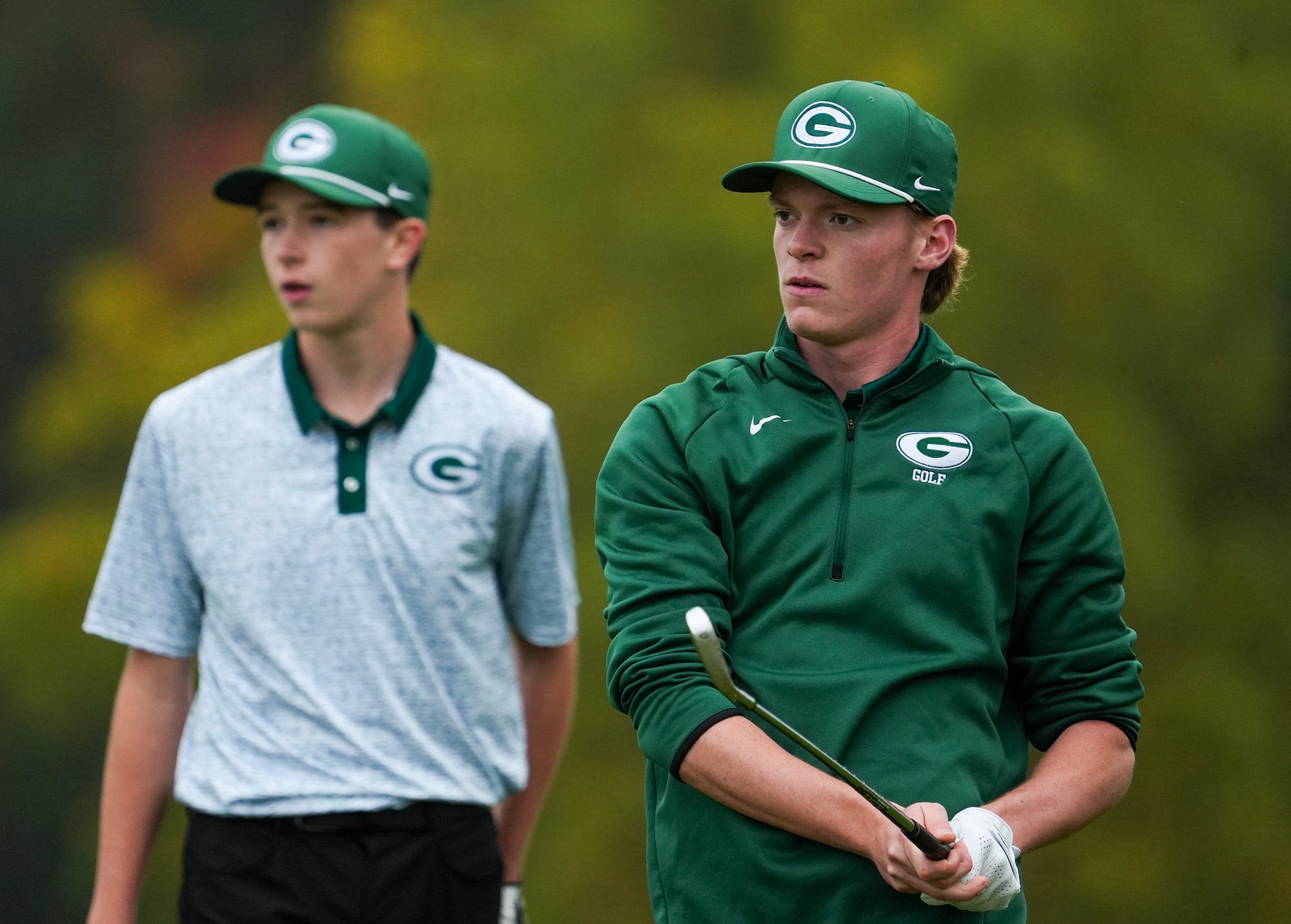 Grafton’s Ryan Chagnon, right, watches his drive with teammate Jack Ryan Oct. 13 at Highfields Golf &amp; Country Club in Grafton.