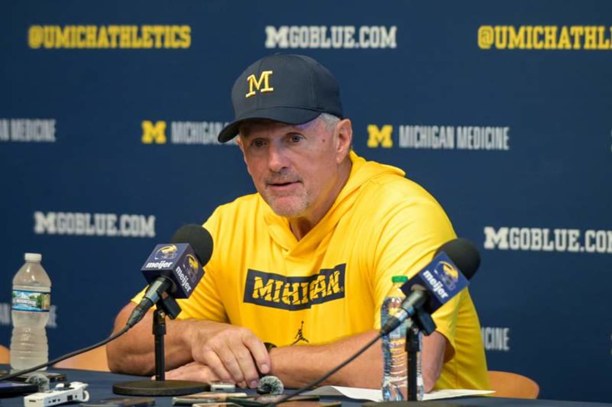ANN ARBOR, MICHIGAN – SEPTEMBER 12: Head Coach Kyle Whittingham of the Michigan Wolverines speaks to media during the post game press conference after a college football game against the Oklahoma Sooners at Michigan Stadium on September 12, 2026 in Ann Arbor, Michigan. The Michigan Wolverines won the game 17-10. (Photo by Aaron J. Thornton/Getty Images) ©Getty Images