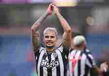 Bruno Guimaraes of Newcastle United applauds the Newcastle Fans after the Premier League match between Burnley FC and Newcastle United at Turf Moor...
