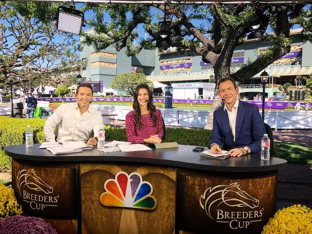 Britney Eurton and two male colleagues seated at the Breeders' Cup desk for NBC Sports.