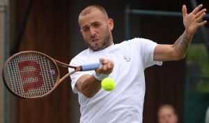 Pictured: Dan Evans hitting a forehand