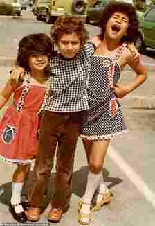Yasmine, pictured at left with her two older siblings, had a relatively normal childhood up until she turned six