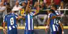 Porto's Radamel Falcao celebrates scoring along with Hulk and Joao Moutinho.