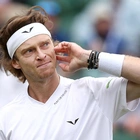 Russian tennis star Andrey Rublev smashes racquet against knee several times during Wimbledon loss