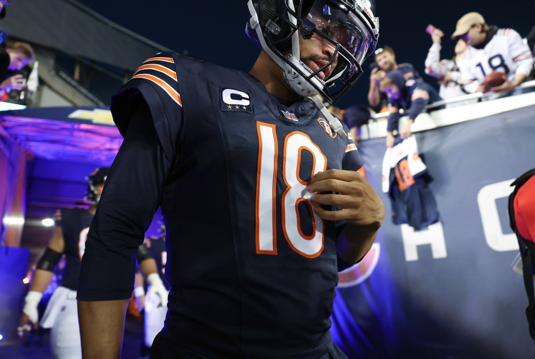 Bears quarterback Caleb Williams enters the field before a game against the Patriots at Soldier Field on Oct. 22, 2026, in Chicago. (John J. Kim/Chicago Tribune)
