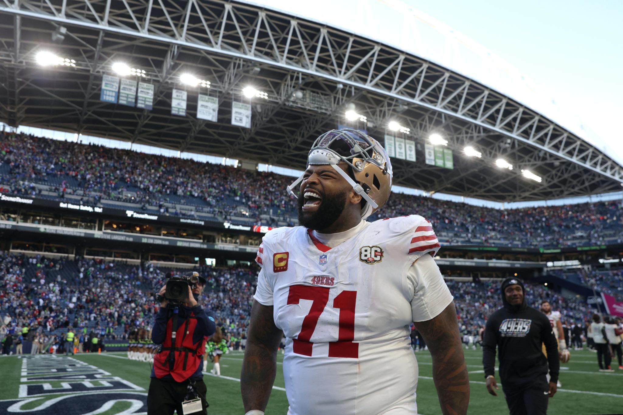 San Francisco 49ers player Trent Williams celebrates on the field during the game against the Seattle Seahawks.