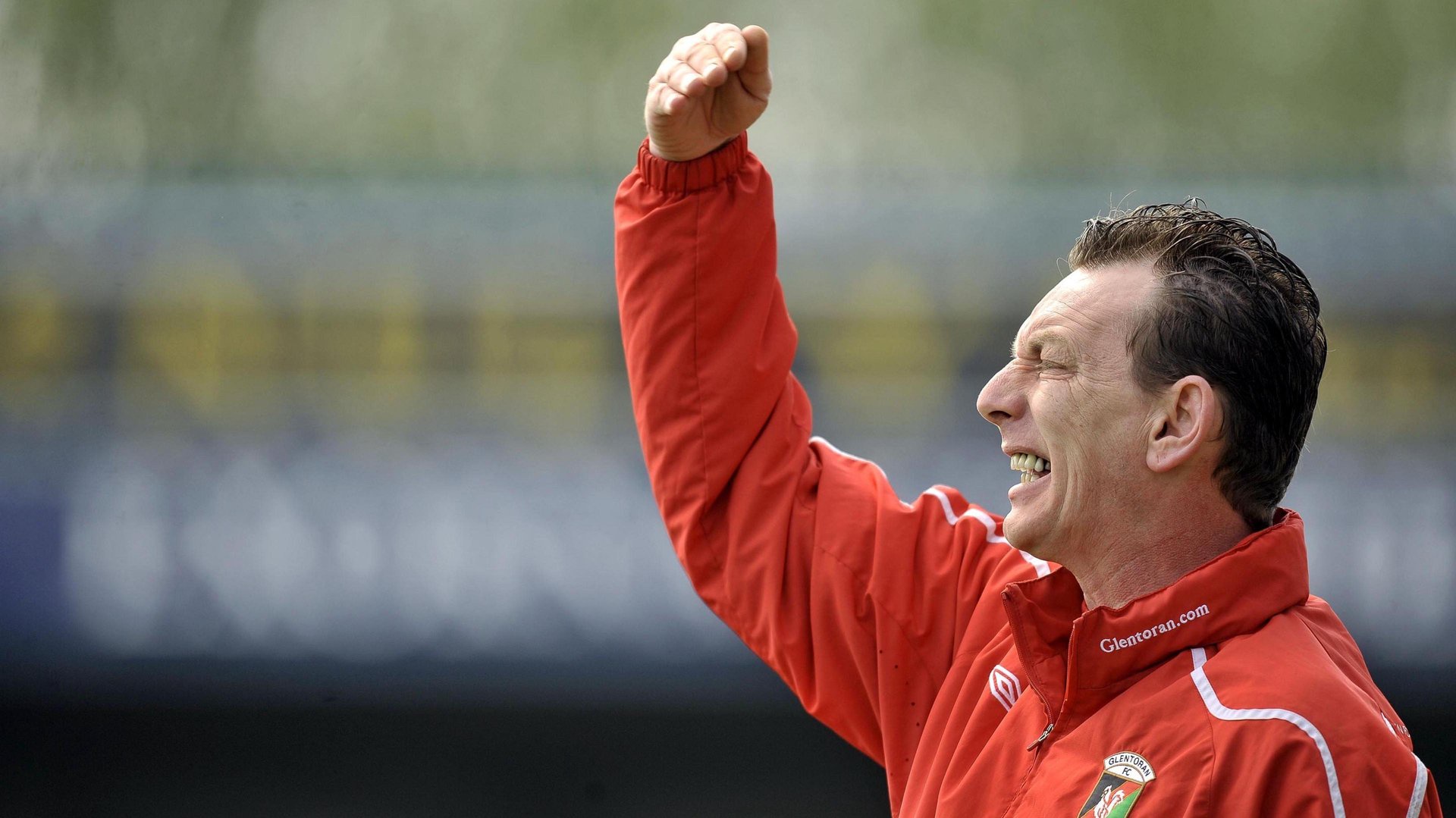 Alan McDonald shields his eyes