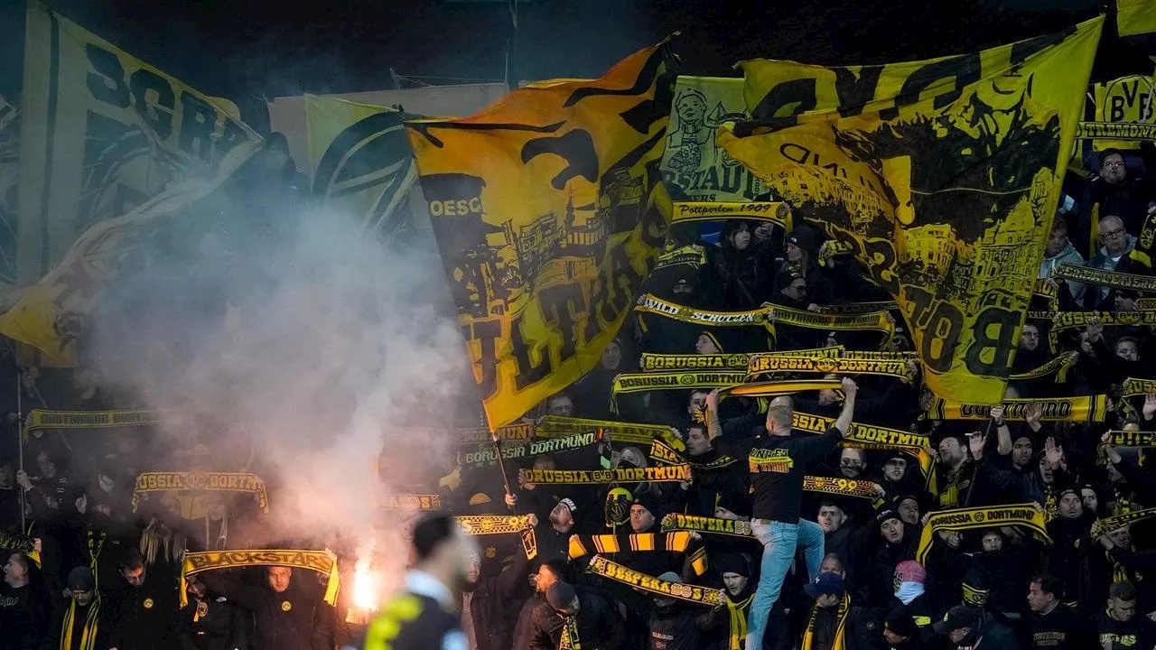 Im Auswärtsblock des BVB: BVB-Fans auf der Suche nach dem goldenen Moment
