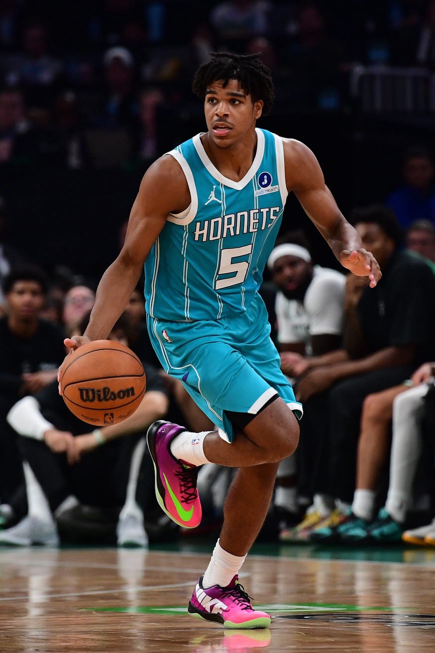 Oct 14, 2026; Boston, Massachusetts, USA;  Charlotte Hornets guard Christian Anderson (5) controls the ball during the second half against the Boston Celtics at TD Garden. Mandatory Credit: Bob DeChiara-Imagn Images