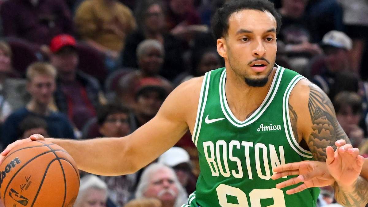 Devin Carter #99 of the Boston Celtics dribbles
