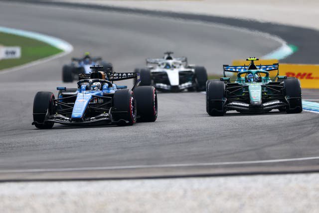 Alonso clashed with Alex Albon (left) in Austin