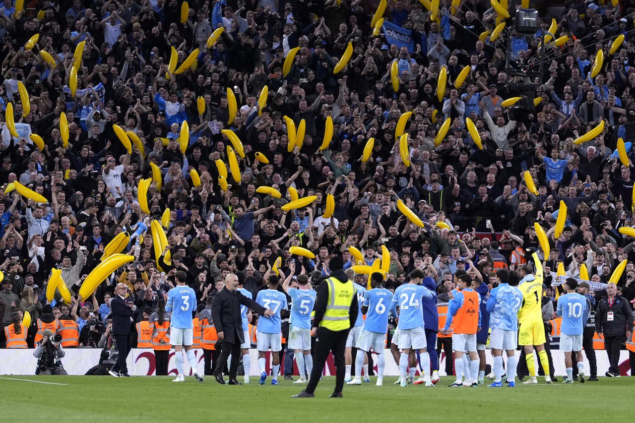Manchester City celebrate victory at Anfield