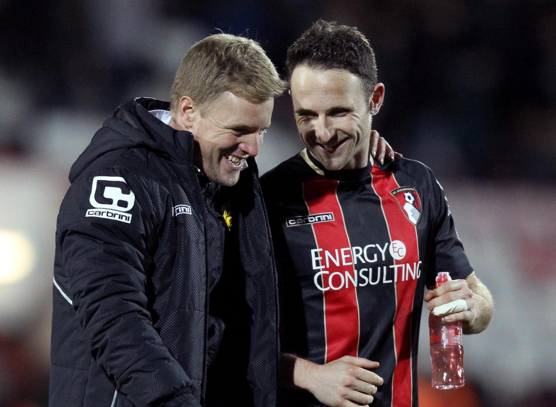 Eddie Howe and Marc Pugh celebrate after a Bournemouth match