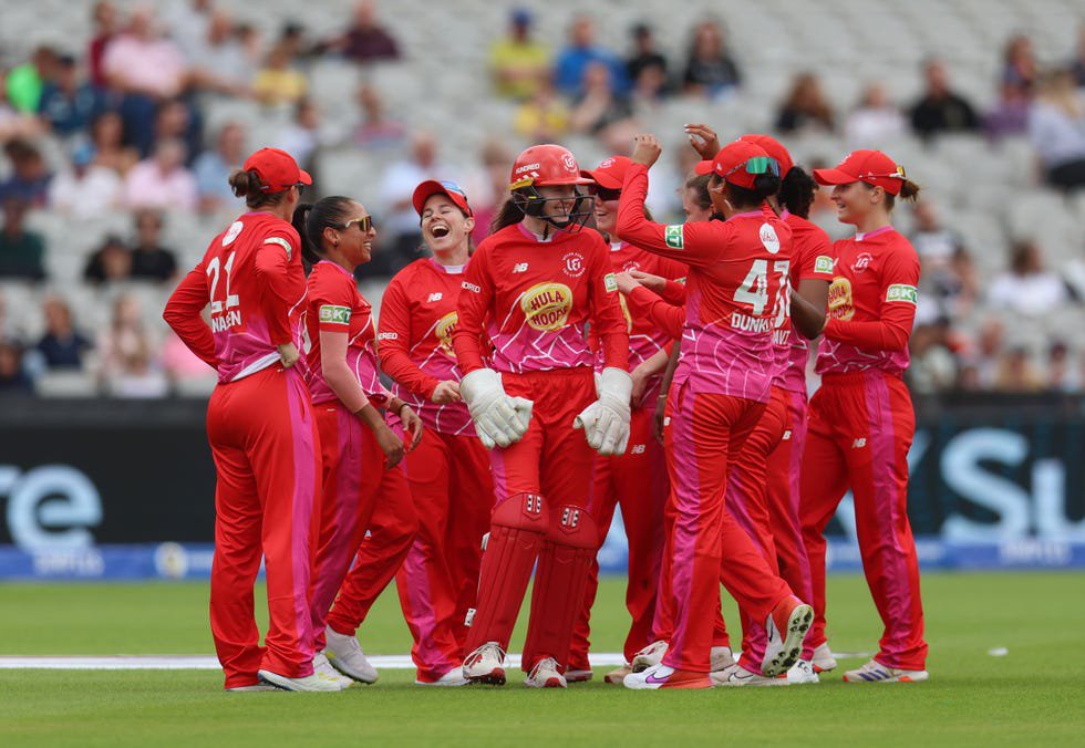 the welsh fire women's cricket team celebrate during a match in the hundred tournament