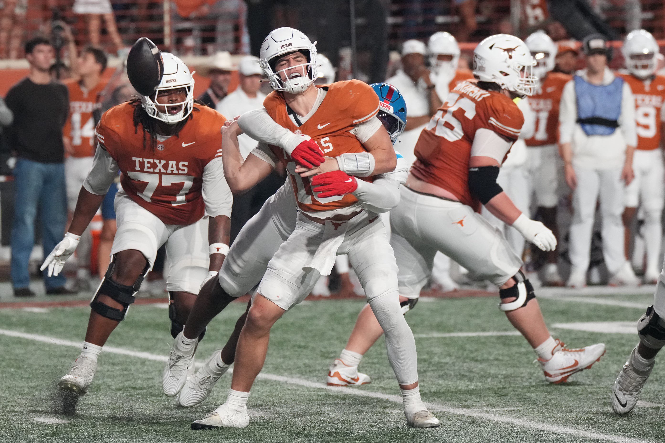 Oct 24, 2026; Austin, Texas, USA;  Mississippi Rebels defensive end Blake Purchase (3) sacks Texas Longhorns quarterback Arch Manning (16), forcing a fumble, during the second half at Darrell K Royal-Texas Memorial Stadium.  Mandatory Credit: Scott Wachter-Imagn Images