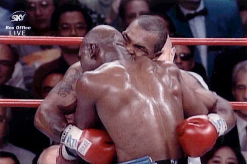 Tyson bites Evander Holyfield's ear during their 1997 fight