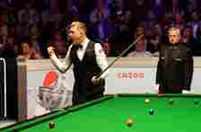 Kyren Wilson celebrates after clinching his first world title