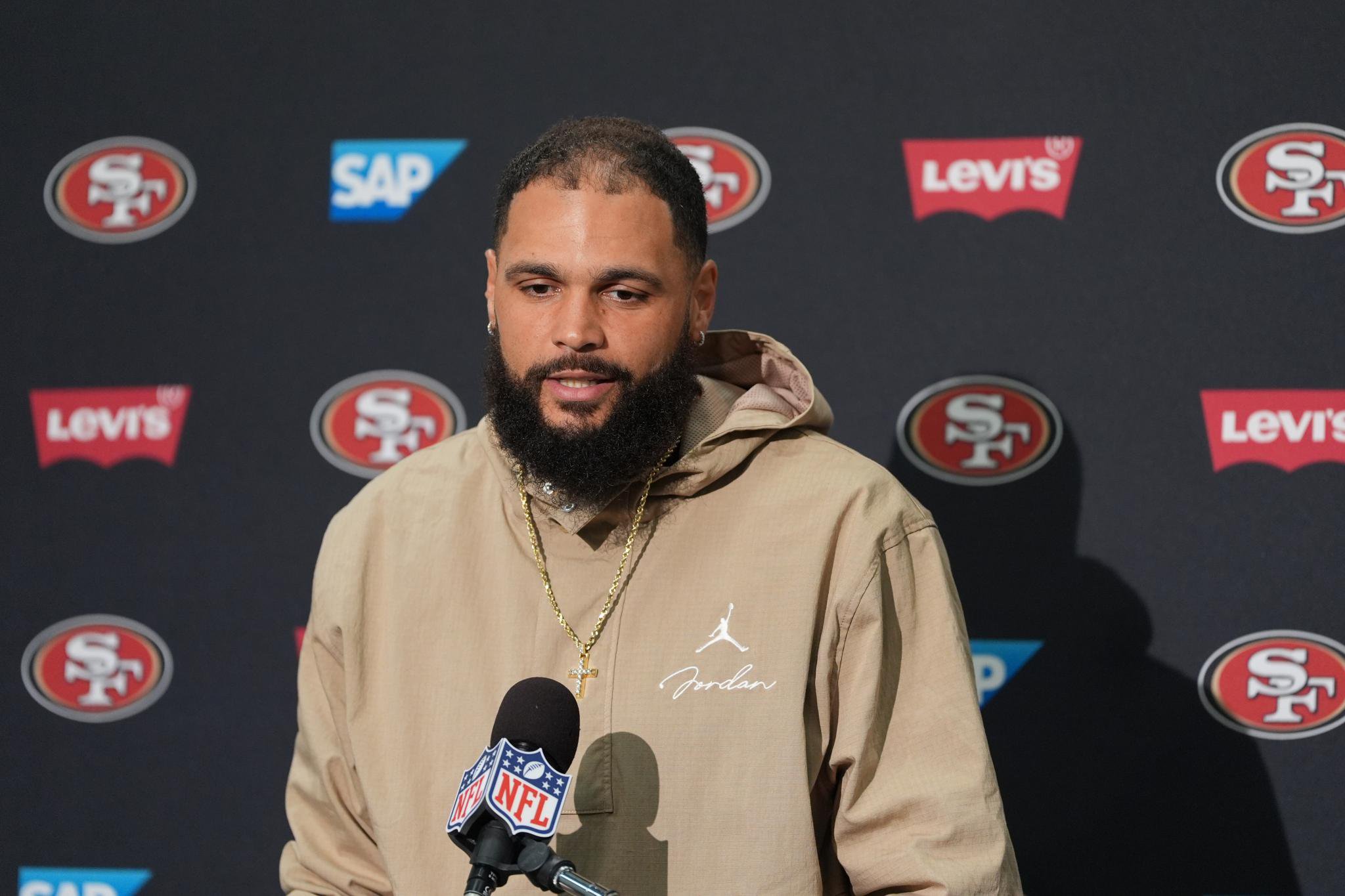 San Francisco 49ers wide receiver Mike Evans talks to reporters following an NFL football game against the Seattle Seahawks, Sunday, Oct. 11, 2026, in Seattle.