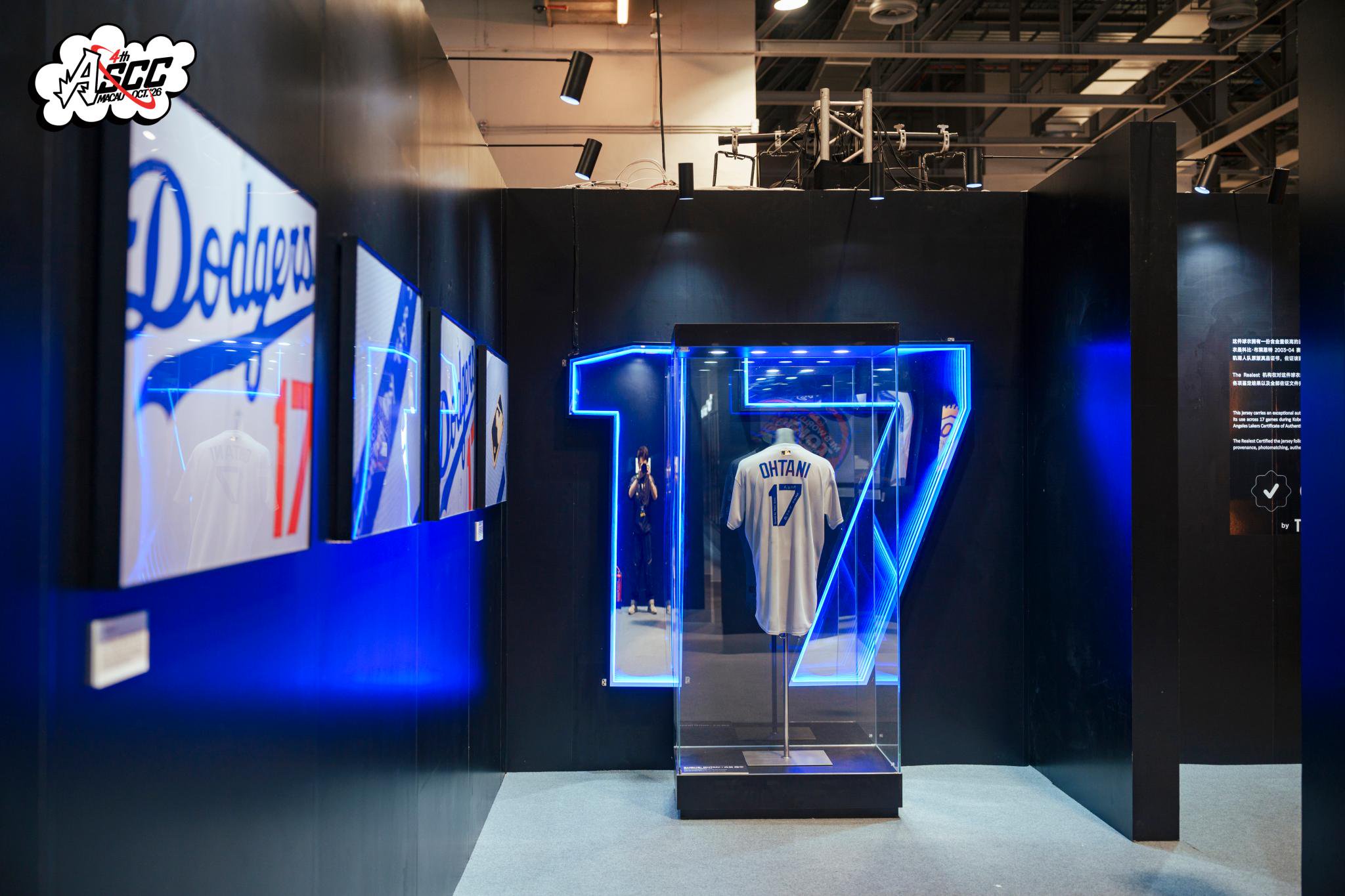 A game-worn Shohei Ohtani Dodgers jersey displayed in a lit case shaped like the number 17.