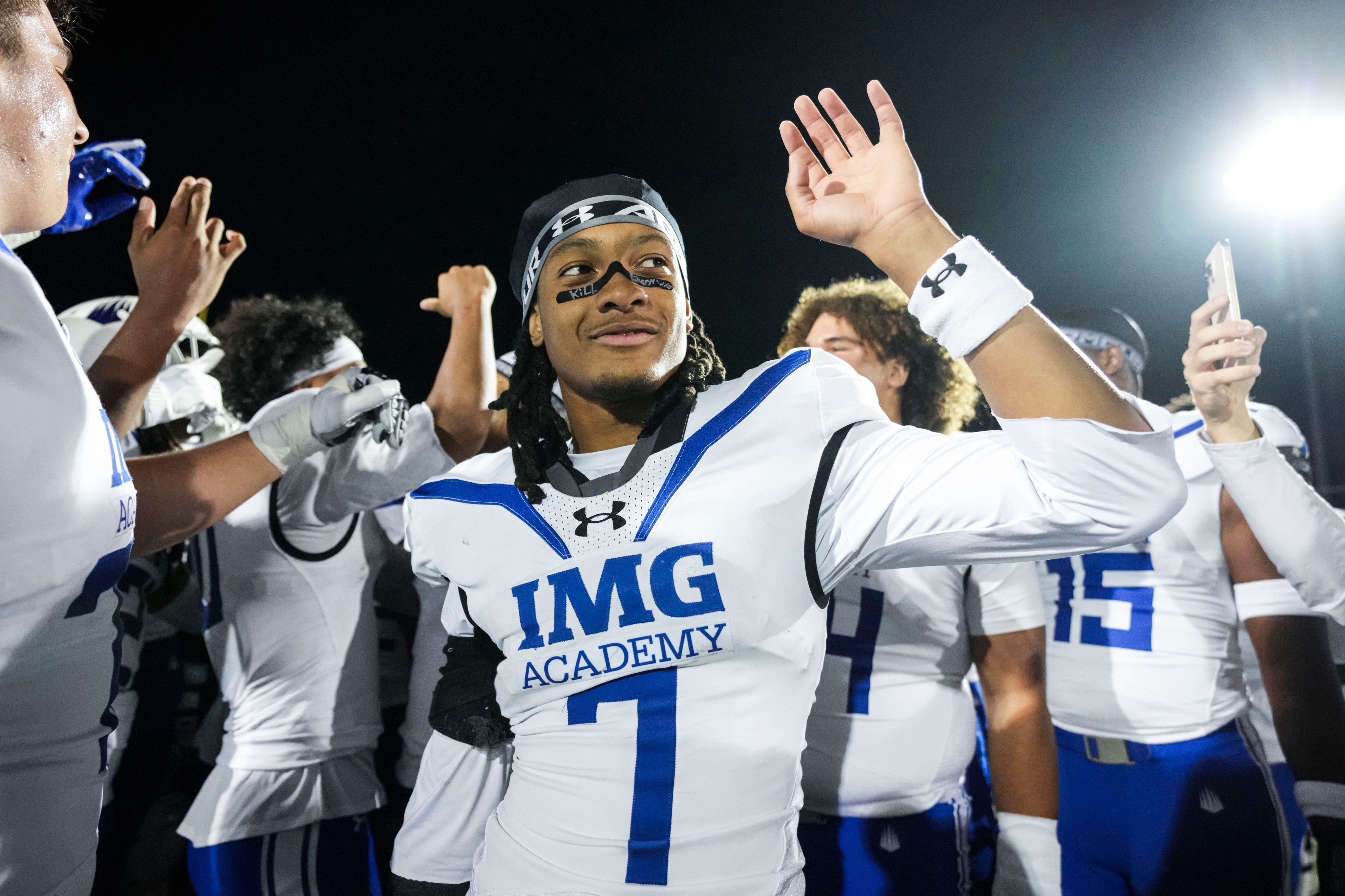 IMG Academy Ascenders Chuck Roberts (7) smiles Friday, Oct. 9, 2026, after a game at New Palestine High School in New Palestine, Ind. The IMG Academy Ascenders defeated the New Palestine Dragons, 49-7.