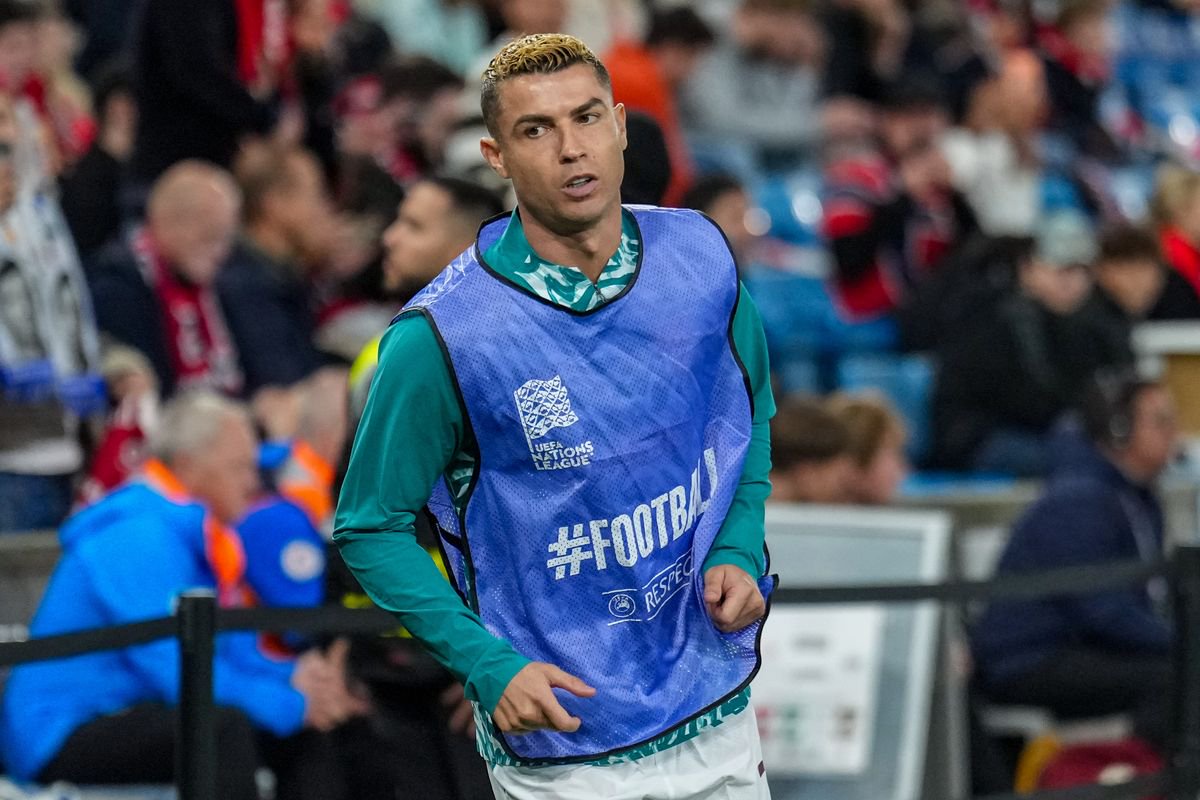 Cristiano Ronaldo warming up as a substitute