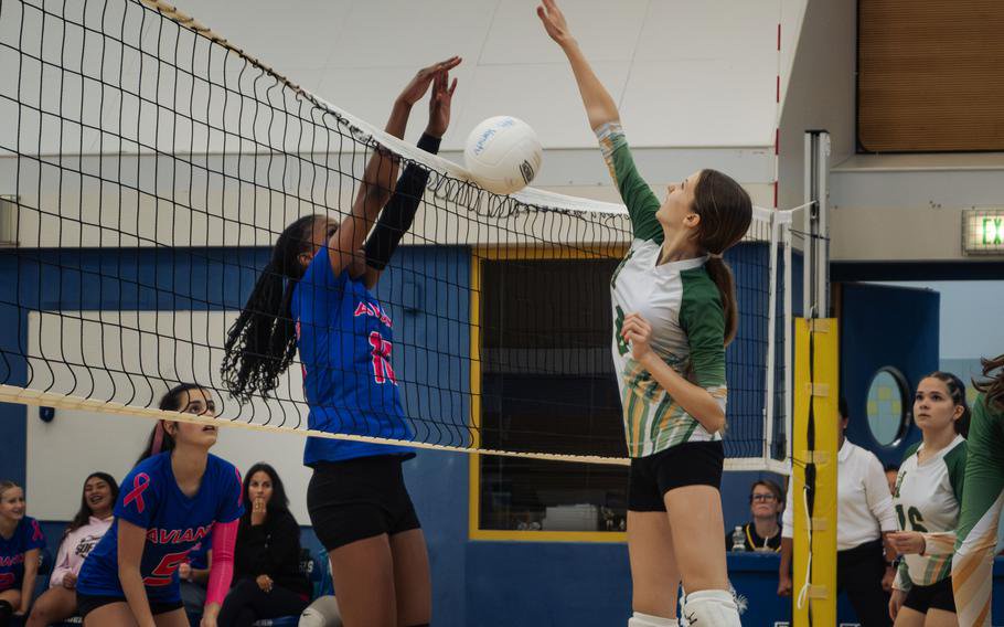 The Aviano Saints’ Serenity Lucas and Alconbury Dragons’ Rachel Hiles battle for a point during a volleyball tournament hosted in Hohenfels, Germany, on Oct. 17, 2026.