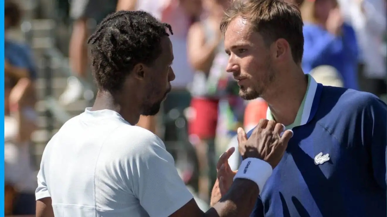 Pictured: Gael Monfils shakes hands with Daniil Medvedev