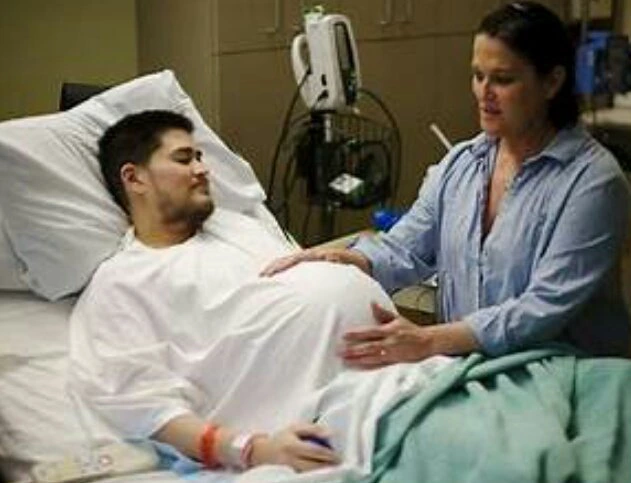 Meet the man who got pregnant and gave birth for his wife because she was barren (photos)