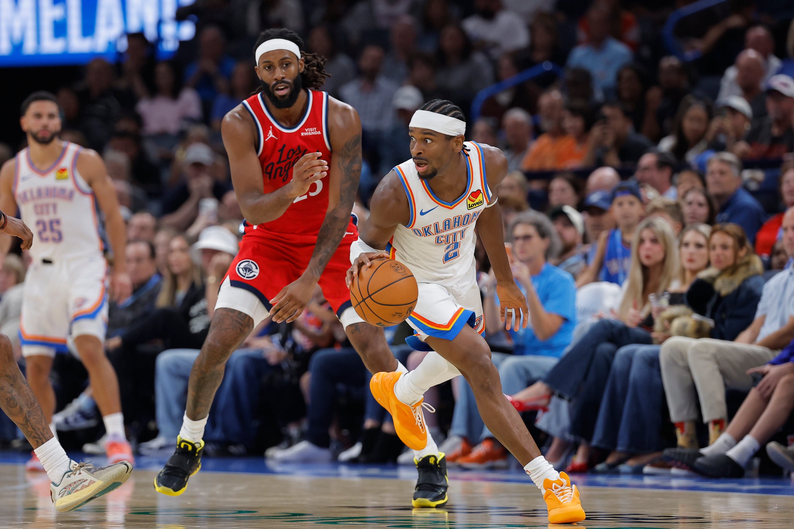 Oct 25, 2026; Oklahoma City, Oklahoma, USA; Oklahoma City Thunder guard Shai Gilgeous-Alexander (2) moves around Los Angeles Clippers forward Isaiah Jackson (23) during the second half at Paycom Center. Mandatory Credit: Alonzo Adams-Imagn Images
