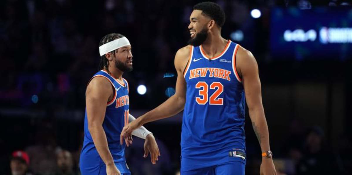 Feb 14, 2026; Los Angeles, CA, USA; Team Knicks guard Jalen Brunson (11) of the New York Knicks and center Karl-Anthony Towns (32) of the New York Knicks react during the shooting stars competition during the 2026 NBA All Star Saturday Night at Intuit Dome. Mandatory Credit: Kirby Lee-Imagn Images ©Kirby Lee-Imagn Images
