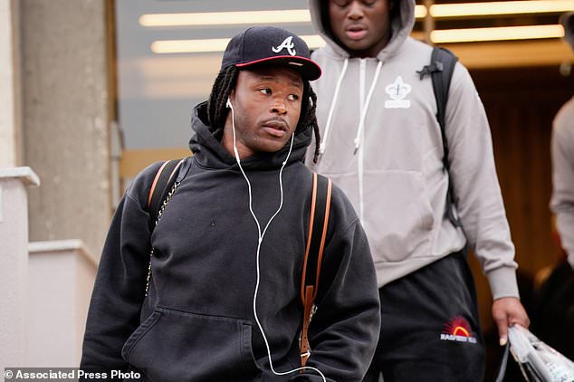 New Orleans Saints' Alvin Kamara arrives at the reception pavilion of Charles de Gaulle airport in Roissy north of Paris, Monday, Oct. 19, 2026. (AP Photo/Teresa Suarez)