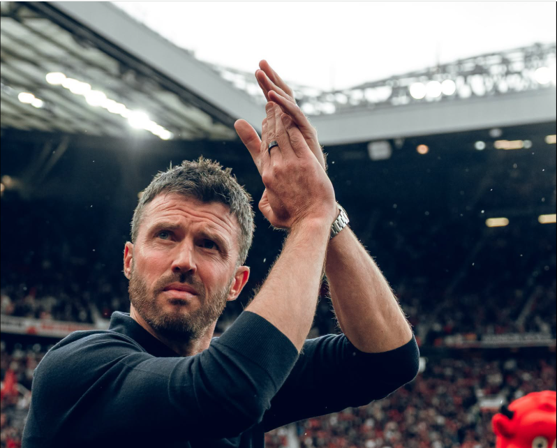 Manchester United manager Michael Carrick applauds club supporters after 1-1 draw with Tottenham Hotspur on Saturday, October 10, 2026 at Old Trafford. PHOTO/https://www.facebook.com/manchesterunited/photos